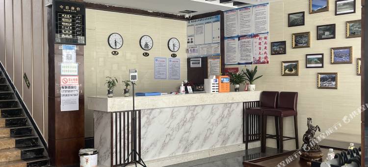 新龙圣洁梁茹酒店图片