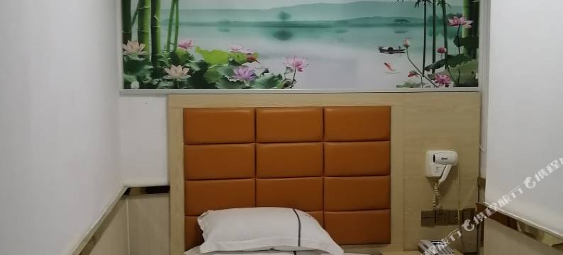 广州富成酒店(罗冲围客运站摩配城店)图片