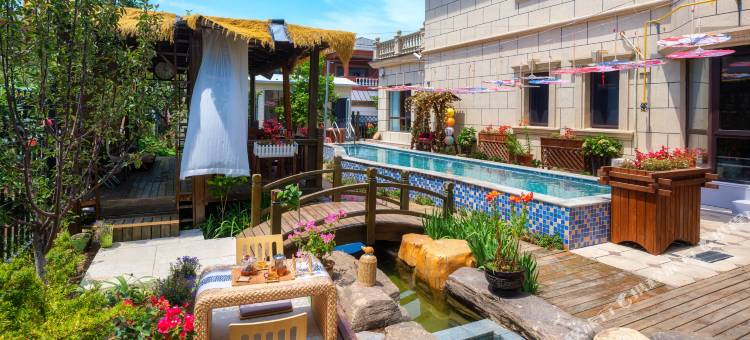 花筑·悦汐汇温泉民宿(金石滩快乐海岸店)图片