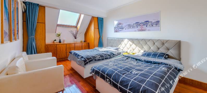 玺乐民宿(青岛国信体育场店)图片