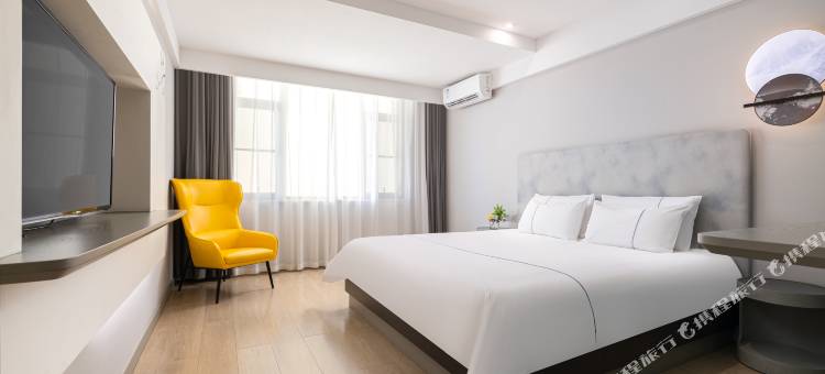 白玉兰酒店(琼海万泉河环球春天广场店)图片