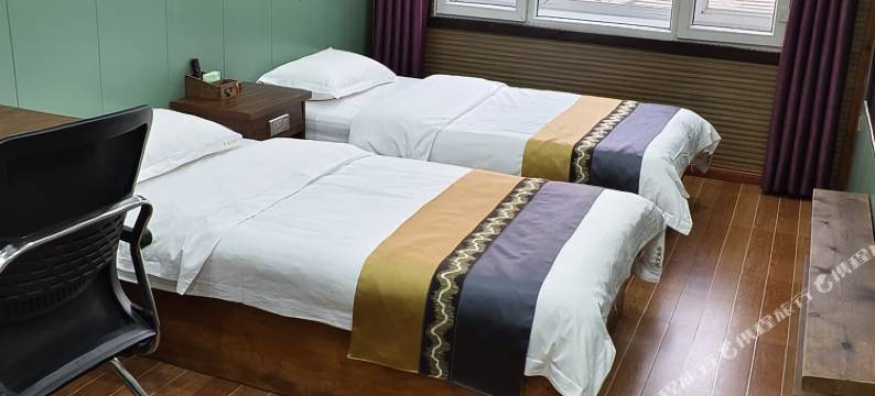 自由空间精品宾馆(青冈县第一中学店)图片