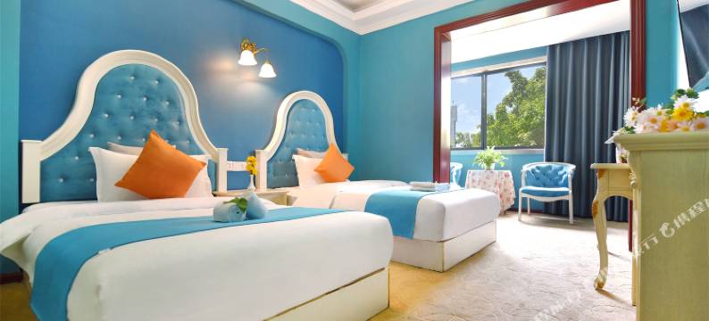 万丽主题酒店(广安摩尔春天百货店)图片