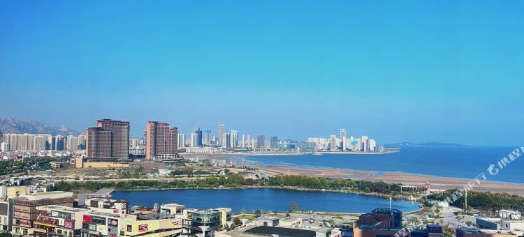 青岛海岸听风酒店(城市阳台欢乐海湾店)图片