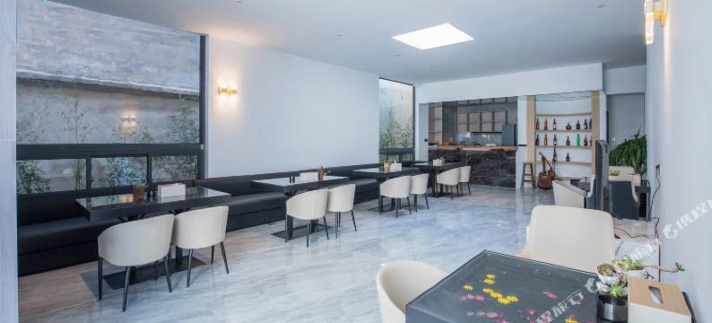 喜云开设计师海景客栈(洱海生态廊道店)图片