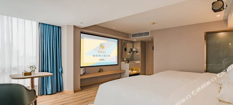 潮漫酒店(江门五邑大学三十三墟街店)图片