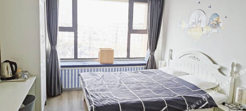 青岛糖菇娘小驻公寓图片