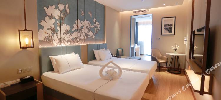 白玉兰酒店(成都海峡茶城三河场地铁站店)图片