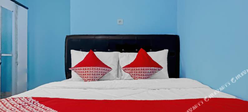 OYO 90594法查尔旅馆(Fajar Inn Mitra RedDoorz)图片