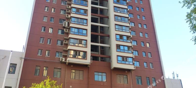 西安金芒果公寓酒店(西安高铁北站红会医院北区店)图片