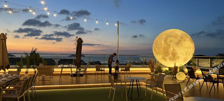 威海天和美术馆酒店(葡萄滩海水浴场店)图片