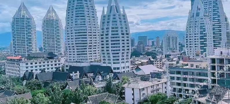 芒果御园酒店(景洪曼听公园店)图片