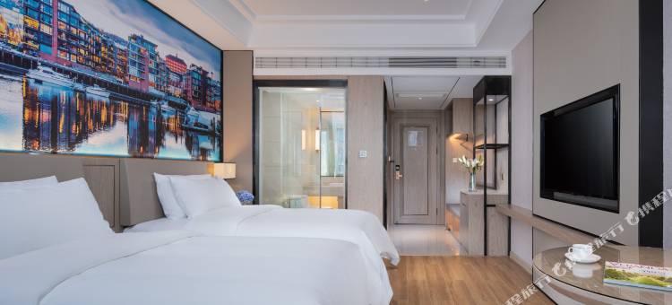 维也纳国际酒店(绿地东海岸可乐村地铁站店)图片