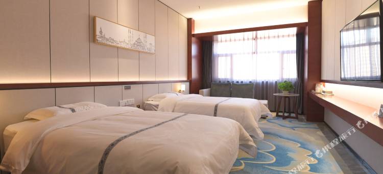 松原万华酒店(滨江中学新天地购物公园店)图片