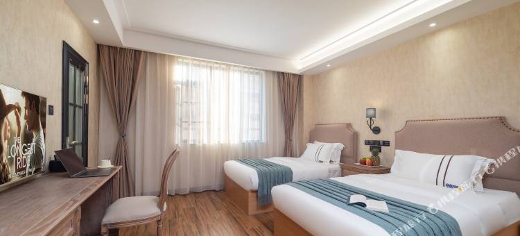 超越梦想酒店(西双版纳景洪告庄西双景星光夜市店)图片