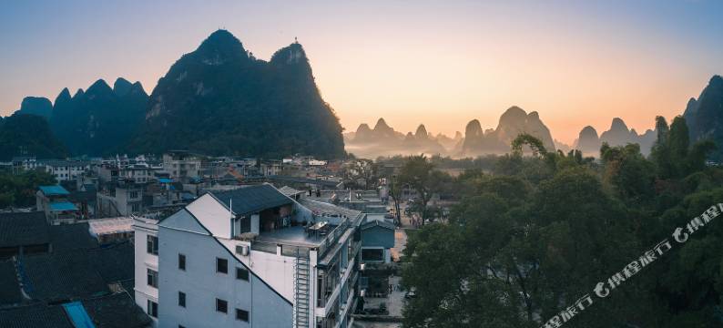 榕忆河畔小住(阳朔兴坪古镇20元人民币背景店)图片