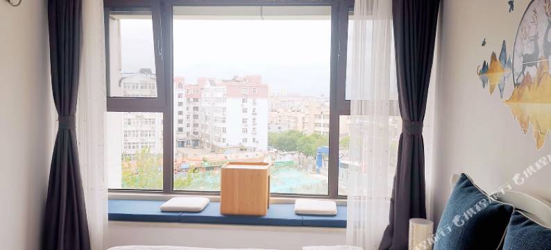 青岛糖菇娘小驻公寓图片