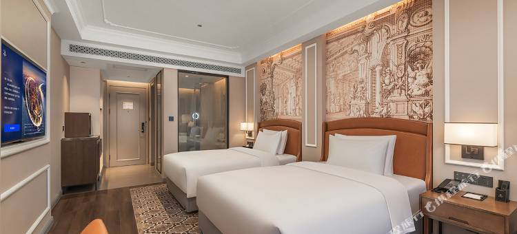 维也纳国际酒店(尚志东浦大厦店)图片