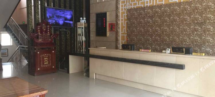 河曲鸣三省商务酒店图片