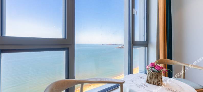 沐海海景民宿(海信海景壹号火炬八街店)图片