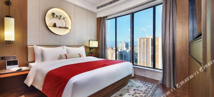 丽橙酒店·逸(西安永宁门省人民医院黄雁村地铁站店)图片