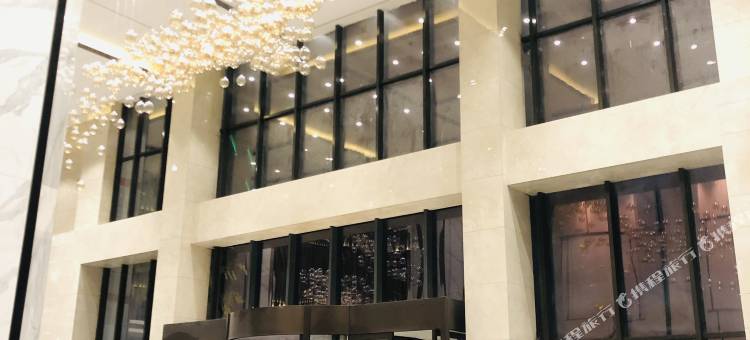 新县新云畔酒店(火车站店)图片
