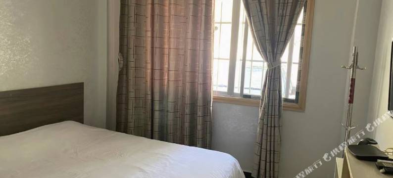 巧马迎春宾馆(余安高速收费站店)图片