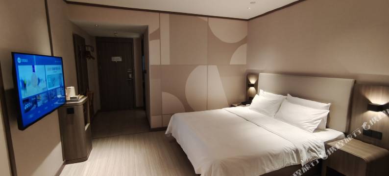 全淇轻居酒店(丹阳火车站眼镜城店)图片