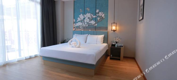 白玉兰酒店(成都海峡茶城三河场地铁站店)图片