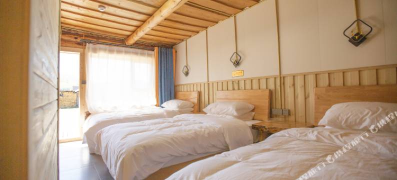 禾木花田山庄图片