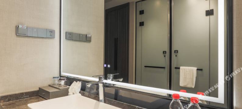 泓悦·影素酒店(自贡高铁站店)图片