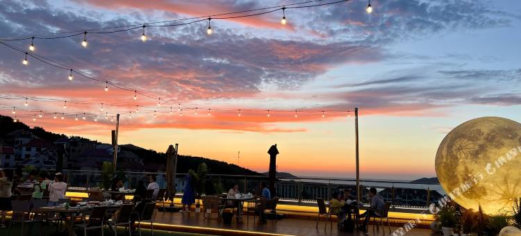 威海天和美术馆酒店(葡萄滩海水浴场店)图片