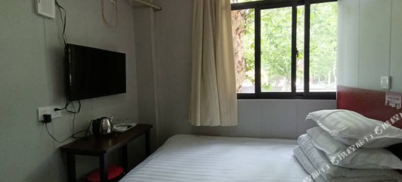 南京好运旅馆(中山北路虹桥地铁站店)图片