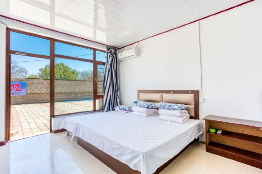 营口鲅鱼圈白沙湾留金睡悦木屋别墅22号店