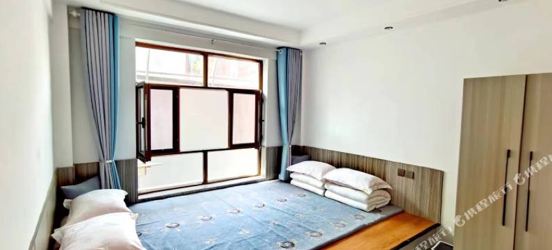 特克斯落凰阁民宿(八卦城店)图片