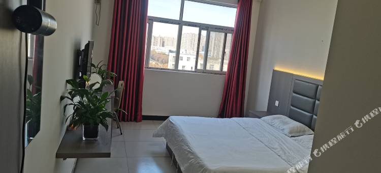 OYO新郑莱湾宾馆(河南工程学院店)图片