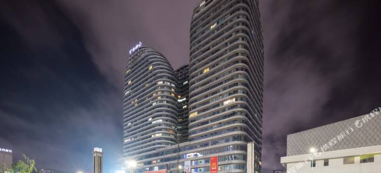拜然·私汤智能影院设计师酒店(兴义桔山广场汇金中心店)图片