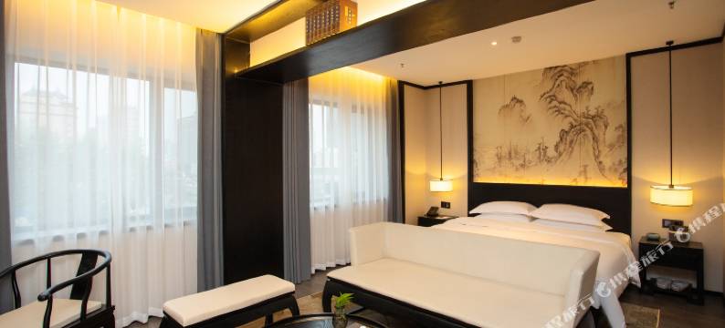 小城顾氏精品文化酒店(长春火车站西安桥轻轨站店)图片