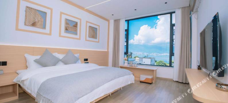 大理洱上花开海景客栈(洱海公园高铁北站店)图片