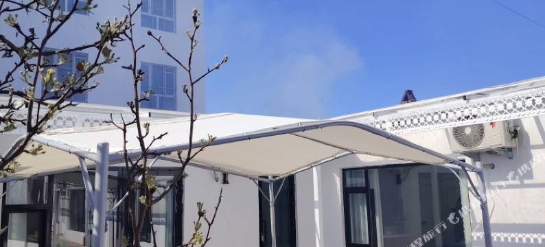 特克斯青屿木民宿(特克斯八卦城离街店)图片