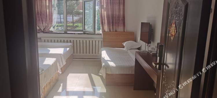 根河市满归镇暖冬宾馆图片