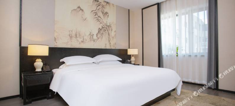 小城顾氏精品文化酒店(长春火车站西安桥轻轨站店)图片