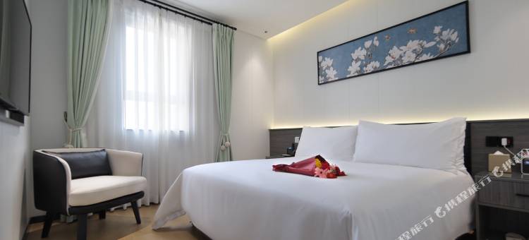 白玉兰酒店(绵阳七星楼高铁站店)图片