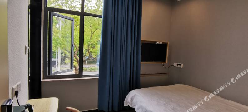 茸华宾馆(上海松江体育中心地铁站店)图片