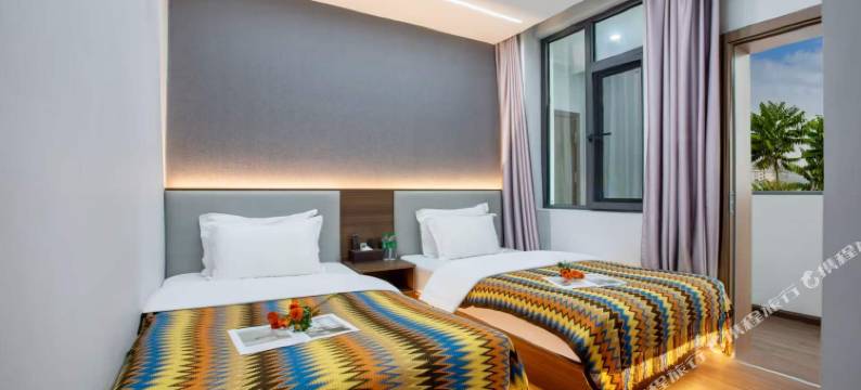 西双版纳景洪贝壳酒店(告庄西双景店)图片