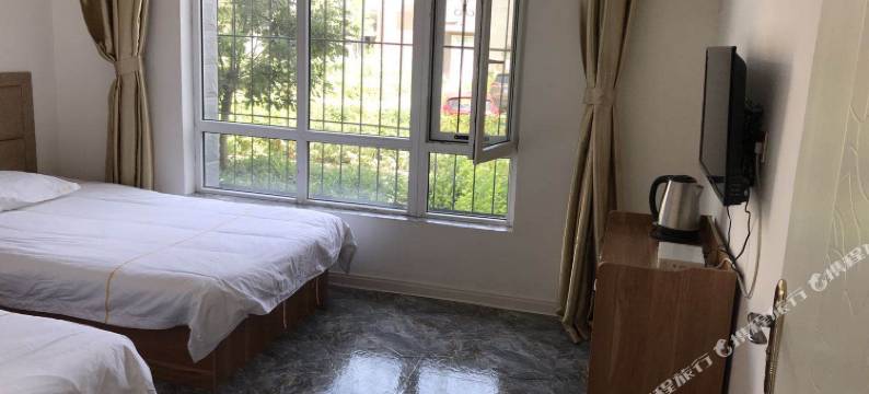 大同万客来快捷宾馆(大同南站方特欢乐世界店)图片