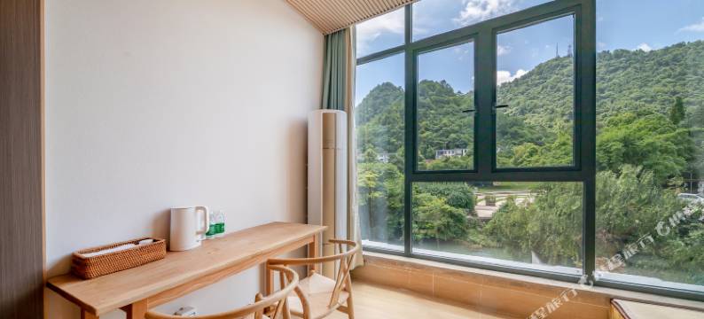 在别处·慢居(花溪公园十里河滩店)图片