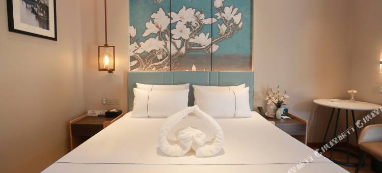 白玉兰酒店(成都海峡茶城三河场地铁站店)图片