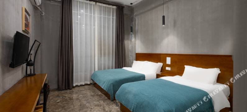 喜上花田设计酒店(海口美兰机场店)图片