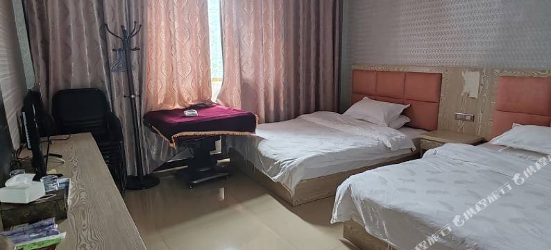 盘县逸然轩商务酒店图片